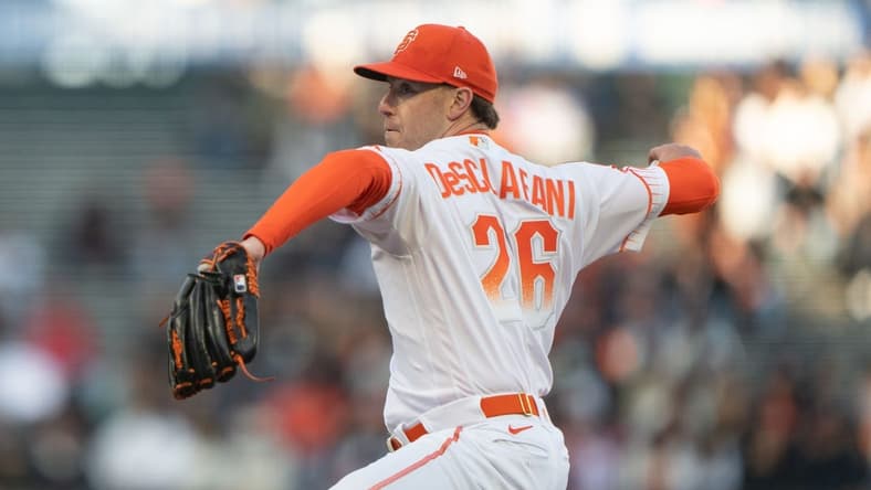 Jun 20, 2023; San Francisco, California, USA; San Francisco Giants starting pitcher Anthony DeSclafani (26) pitches during the first inning against the San Diego Padres at Oracle Park. Mandatory Credit: Stan Szeto-USA TODAY Sports