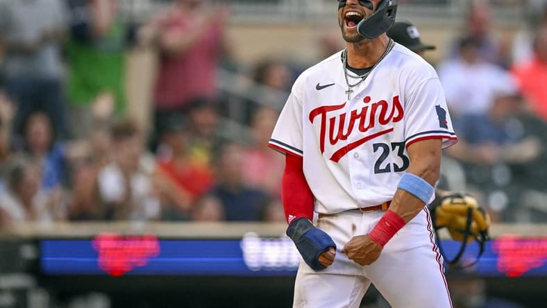 Jun 21, 2023; Minneapolis, Minnesota, USA; Minnesota Twins infielder Royce Lewis (23) reacts after scoring a run against the Boston Red Sox during the second inning at Target Field. Mandatory Credit: Nick Wosika-USA TODAY Sports