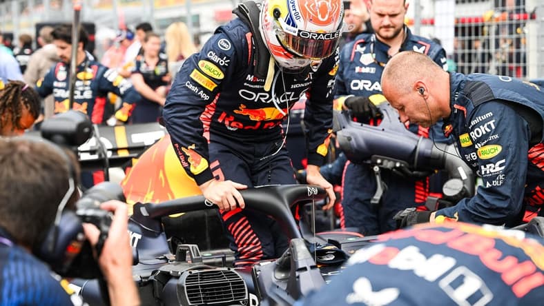 Jun 18, 2023; Montreal, Quebec, CAN; Red Bull Racing driver Max Verstappen (NED) pulls out of his car prior to the Canadian Grand Prix at Circuit Gilles Villeneuve. Mandatory Credit: David Kirouac-USA TODAY Sports