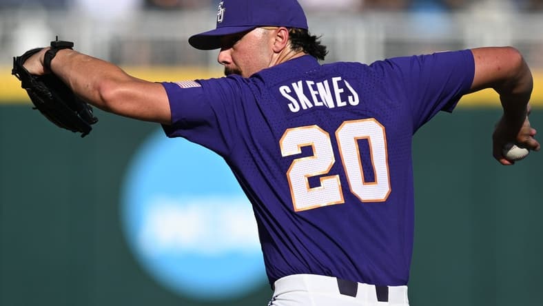 Jun 22, 2023; Omaha, NE, USA; LSU Tigers starting pitcher Paul Skenes (20) throws against the Wake Forest Demon Deacons in the first inning at Charles Schwab Field Omaha. Mandatory Credit: Steven Branscombe-USA TODAY Sports