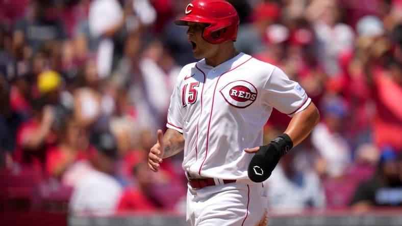 Jun 25, 2023; Cincinnati, Ohio, USA; Cincinnati Reds third baseman Nick Senzel (15) reacts after scoring on a double hit by Cincinnati Reds second baseman Matt McLain (not pictured) in the fourth inning of a baseball game against the Atlanta Braves at Great American Ball Park. The Atlanta Braves won, 7-6. Mandatory Credit: Kareem Elgazzar-USA TODAY Sports