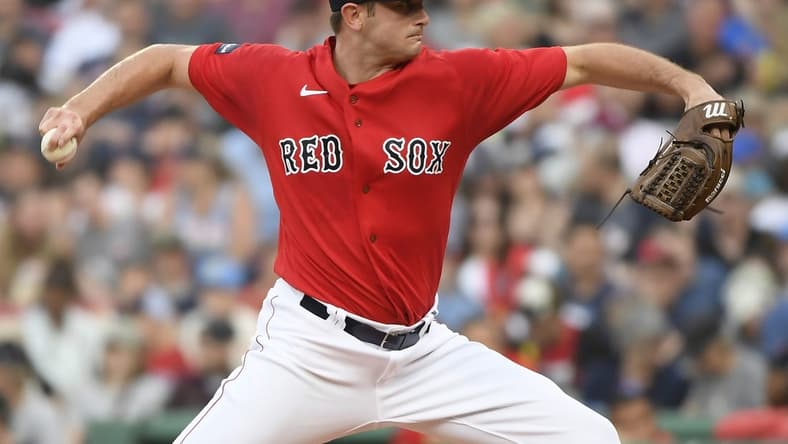 Jun 27, 2023; Boston, Massachusetts, USA; Boston Red Sox starting pitcher Garrett Whitlock (22) pitches during the first inning against the Miami Marlins at Fenway Park. Mandatory Credit: Bob DeChiara-USA TODAY Sports