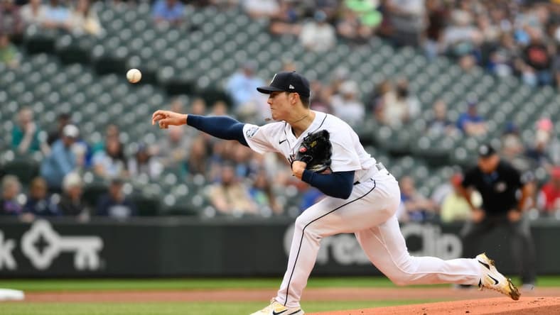 Jun 27, 2023; Seattle, Washington, USA; Seattle Mariners starting pitcher Bryan Woo (33) pitches to the Washington Nationals during the first inning at T-Mobile Park. Mandatory Credit: Steven Bisig-USA TODAY Sports