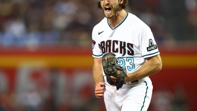 Jun 27, 2023; Phoenix, Arizona, USA; Arizona Diamondbacks pitcher Zac Gallen reacts as he celebrates the final out of the sixth inning against the Tampa Bay Rays at Chase Field. Mandatory Credit: Mark J. Rebilas-USA TODAY Sports