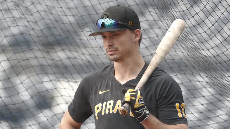 Jun 29, 2023; Pittsburgh, Pennsylvania, USA; Pittsburgh Pirates left fielder Bryan Reynolds (10) in the batting cage before the game against the San Diego Padres at PNC Park. Mandatory Credit: Charles LeClaire-USA TODAY Sports