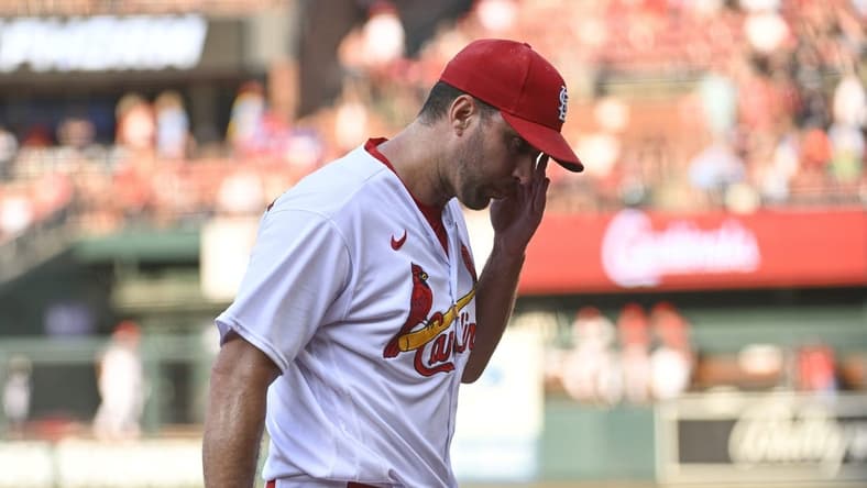 Jun 29, 2023; St. Louis, Missouri, USA; St. Louis Cardinals starting pitcher Adam Wainwright (50) reacts while walking off the field after being pulled by St. Louis Cardinals manager Oliver Marmol (37) (not pictured) against the Houston Astros in the second inning at Busch Stadium. Mandatory Credit: Joe Puetz-USA TODAY Sports