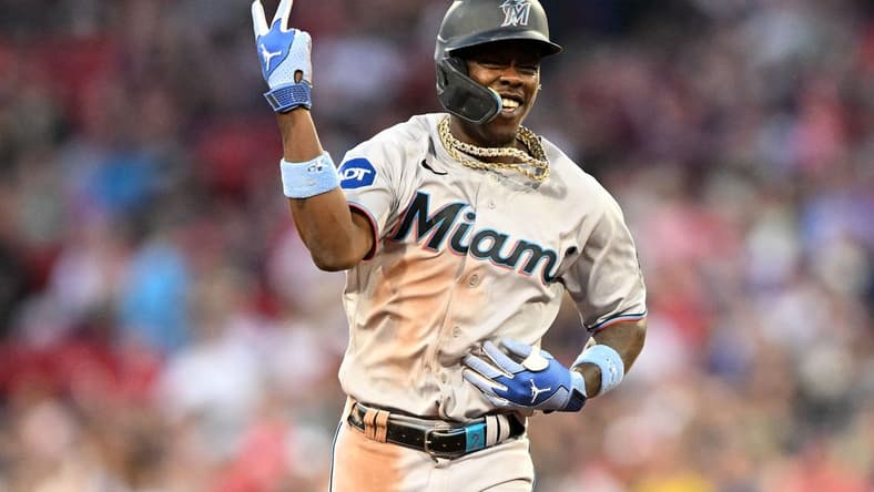 Jun 29, 2023; Boston, Massachusetts, USA; Miami Marlins center fielder Jazz Chisholm Jr. (2) reacts after hitting a home run against the Boston Red Sox during the ninth inning at Fenway Park. Mandatory Credit: Brian Fluharty-USA TODAY Sports