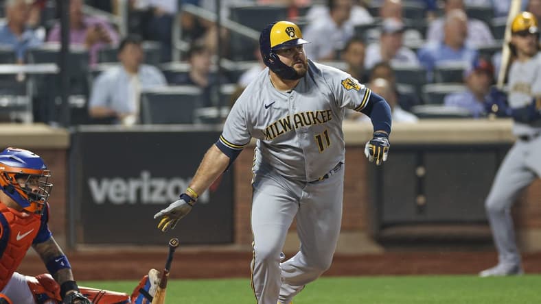 Jun 29, 2023; New York City, New York, USA; Milwaukee Brewers first baseman Rowdy Tellez (11) singles during the sixth inning against the New York Mets at Citi Field. Mandatory Credit: Vincent Carchietta-USA TODAY Sports