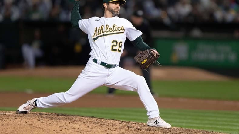 Jun 28, 2023; Oakland, California, USA;   Oakland Athletics relief pitcher Austin Pruitt (29) pitches during the seventh inning against the New York Yankees at Oakland-Alameda County Coliseum. Mandatory Credit: Stan Szeto-USA TODAY Sports