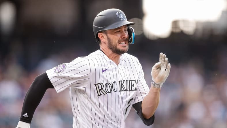 Jun 30, 2023; Denver, Colorado, USA; Colorado Rockies right fielder Kris Bryant (23) runs to first on a fielders choice RBI in the first inning against the Detroit Tigers at Coors Field. Mandatory Credit: Isaiah J. Downing-USA TODAY Sports
