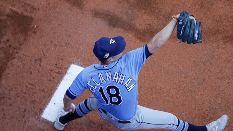 Jun 30, 2023; Seattle, Washington, USA; Tampa Bay Rays starting pitcher Shane McClanahan (18) warms up in the bullpen before a game against the Seattle Mariners at T-Mobile Park. Mandatory Credit: Joe Nicholson-USA TODAY Sports