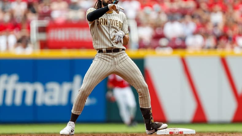 Jul 1, 2023; Cincinnati, Ohio, USA; San Diego Padres right fielder Fernando Tatis Jr. (23) reacts after hitting a RBI double against the Cincinnati Reds in the third inning at Great American Ball Park. Mandatory Credit: Katie Stratman-USA TODAY Sports