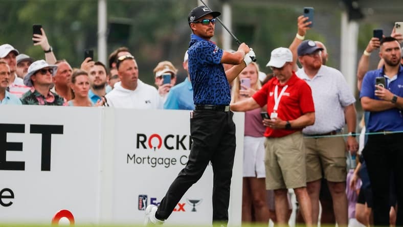 Rickie Fowler tees for the third hole during the third round of the Rocket Mortgage Classic at Detroit Golf Club in Detroit on Saturday, July 1, 2023.