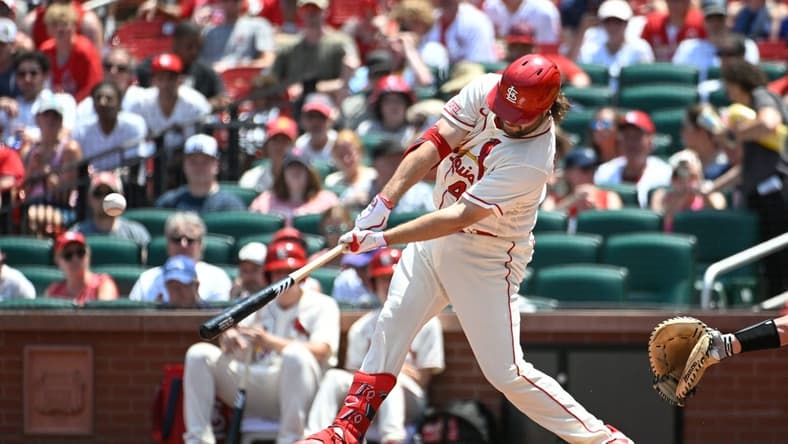 Jul 1, 2023; St. Louis, Missouri, USA; St. Louis Cardinals first baseman Alec Burleson (41) hits an RBI single against the New York Yankees in the third inning in game one of a double header at Busch Stadium. Mandatory Credit: Joe Puetz-USA TODAY Sports