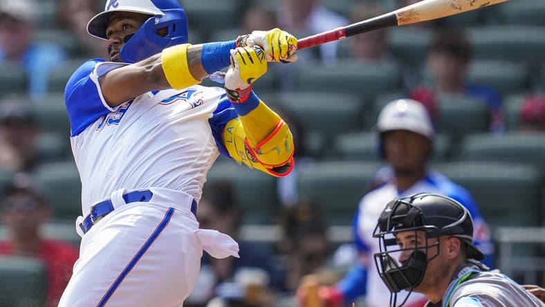 Jul 1, 2023; Cumberland, Georgia, USA; Atlanta Braves right fielder Ronald Acuna Jr. (13) hits a lead off home run against the Miami Marlins during the first inning at Truist Park. Mandatory Credit: Dale Zanine-USA TODAY Sports