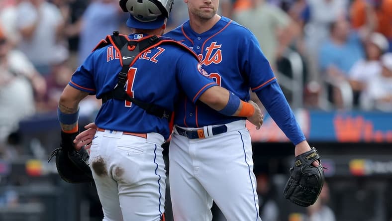 Jul 1, 2023; New York City, New York, USA; New York Mets catcher Francisco Alvarez (4) hugs relief pitcher Adam Ottavino (0) after defeating the San Francisco Giants at Citi Field. Mandatory Credit: Brad Penner-USA TODAY Sports