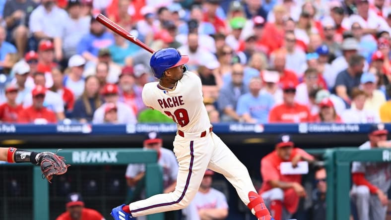 Jul 1, 2023; Philadelphia, Pennsylvania, USA; Philadelphia Phillies outfielder Cristian Pache (19) hits an RBI double against the Washington Nationals in the third inning at Citizens Bank Park. Mandatory Credit: Kyle Ross-USA TODAY Sports