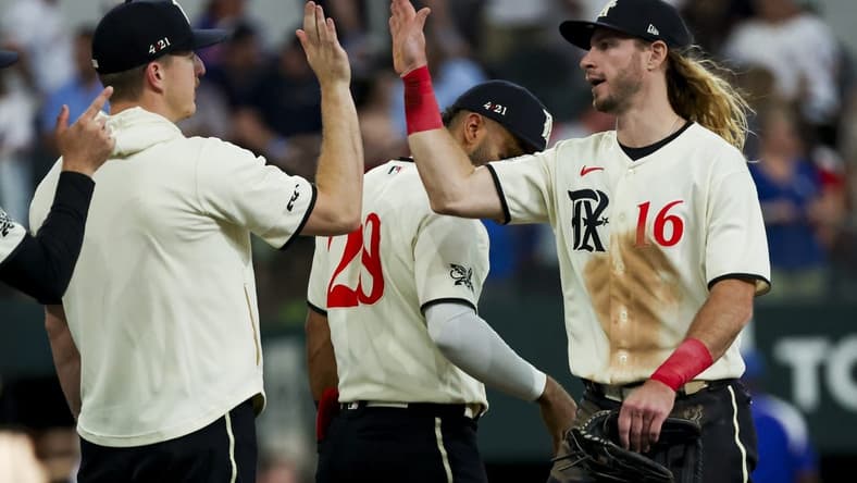 Jul 1, 2023; Arlington, Texas, USA; Texas Rangers left fielder Travis Jankowski (16) celebrates with teammates after the game against the Houston Astros at Globe Life Field. Mandatory Credit: Kevin Jairaj-USA TODAY Sports