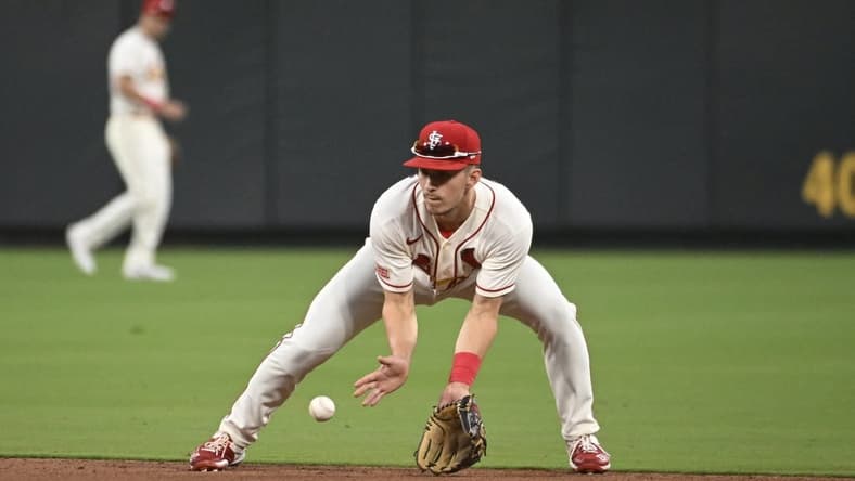 Jul 1, 2023; St. Louis, Missouri, USA; St. Louis Cardinals center fielder Tommy Edman (19) fields a ground ball by the New York Yankees in the eighth inning in game one of a double header at Busch Stadium. Mandatory Credit: Joe Puetz-USA TODAY Sports