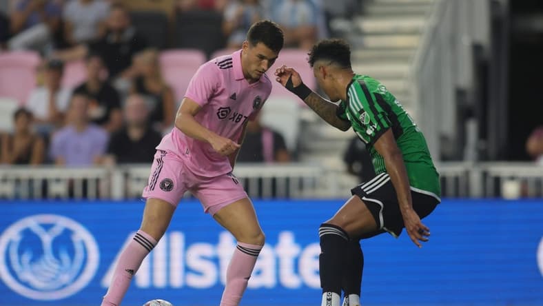 Jul 1, 2023; Fort Lauderdale, Florida, USA; Inter Miami forward Robbie Robinson (19) controls the ball against Austin FC defender Julio Cascante (18) during the first half at DRV PNK Stadium. Mandatory Credit: Sam Navarro-USA TODAY Sports