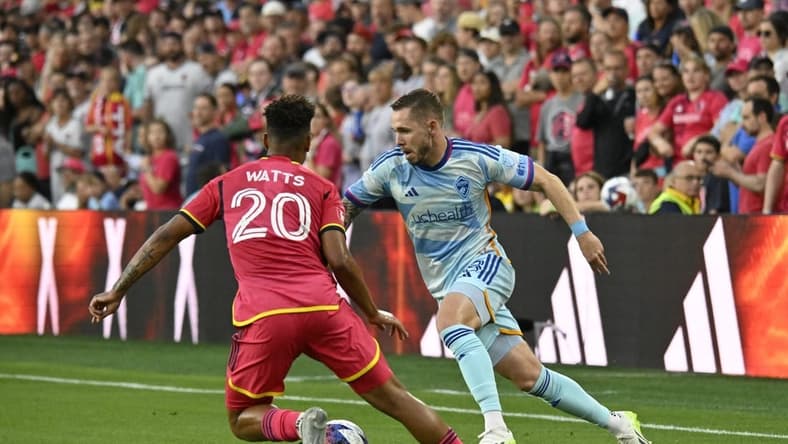 Jul 1, 2023; St. Louis, Missouri, USA; Colorado Rapids midfielder Sam Nicholson (28) tries to get past St. Louis City defender Akil Watts (20) in the first half at CITYPARK. Mandatory Credit: Scott Rovak-USA TODAY Sports