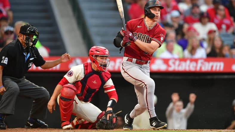 Jul 1, 2023; Anaheim, California, USA; Arizona Diamondbacks right fielder Jake McCarthy (31) reaches first on a fielders choice against the Los Angeles Angels during the second inning at Angel Stadium. Mandatory Credit: Gary A. Vasquez-USA TODAY Sports