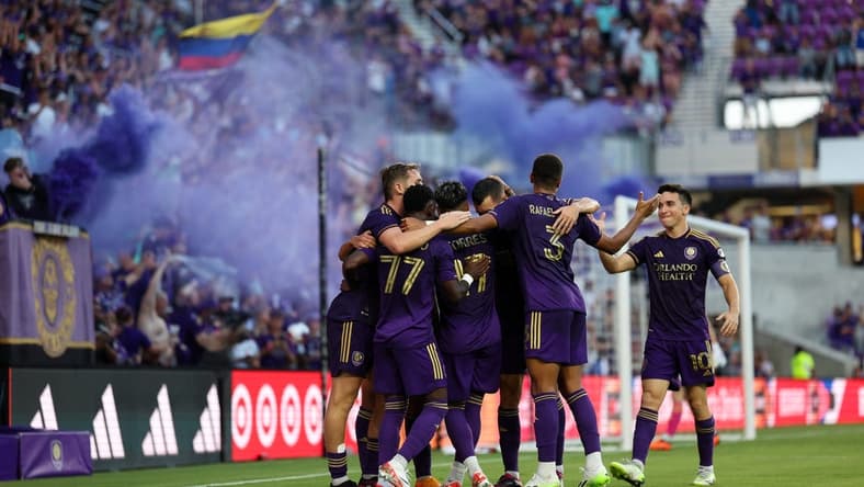Jul 1, 2023; Orlando, Florida, USA; Orlando City SC forward Facundo Torres (17) is congratulated after after scoring a goal against the Chicago Fire FC in the first half at Exploria Stadium. Mandatory Credit: Nathan Ray Seebeck-USA TODAY Sports