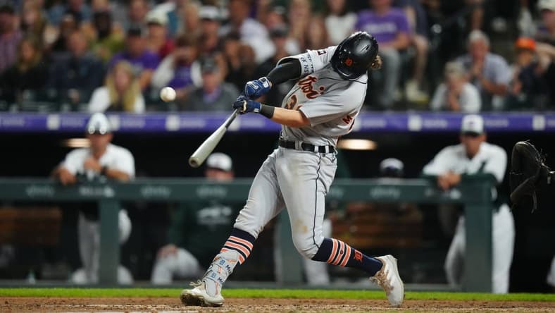 Jul 1, 2023; Denver, Colorado, USA; Detroit Tigers second baseman Zach McKinstry (39) hits a three run home run in the tenth inning against the Colorado Rockies at Coors Field. Mandatory Credit: Ron Chenoy-USA TODAY Sports