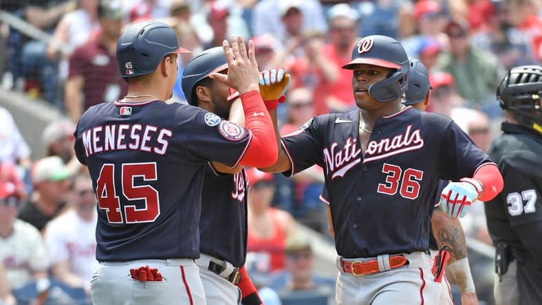Jul 2, 2023; Philadelphia, Pennsylvania, USA; Washington Nationals left fielder Stone Garrett (36) celebrates his grand slam home run with designated hitter Joey Meneses (45) against the Philadelphia Phillies during the third inning at Citizens Bank Park. Mandatory Credit: Eric Hartline-USA TODAY Sports