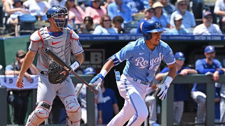 Jul 2, 2023; Kansas City, Missouri, USA; Kansas City Royals second baseman Nicky Lopez (8) hits an RBI single in the fourth inning against the Los Angeles Dodgers at Kauffman Stadium. Mandatory Credit: Peter Aiken-USA TODAY Sports