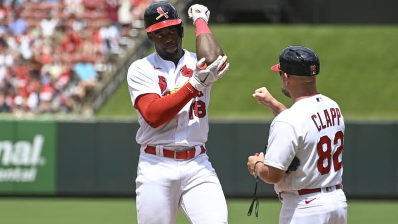 Jul 2, 2023; St. Louis, Missouri, USA; St. Louis Cardinals left fielder Jordan Walker (18) reacts after hitting an RBI single against the New York Yankees in the fourth inning at Busch Stadium. Mandatory Credit: Joe Puetz-USA TODAY Sports