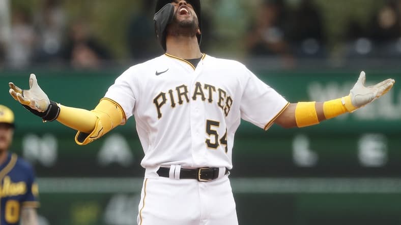 Jul 2, 2023; Pittsburgh, Pennsylvania, USA; Pittsburgh Pirates right fielder Josh Palacios (54) reacts at second base with an RBI double against the Milwaukee Brewers during the eighth inning at PNC Park. The Brewers won 6-3. Mandatory Credit: Charles LeClaire-USA TODAY Sports