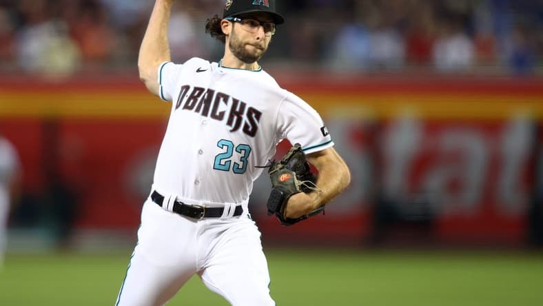 Jun 27, 2023; Phoenix, Arizona, USA; Arizona Diamondbacks pitcher Zac Gallen against the Tampa Bay Rays at Chase Field. Mandatory Credit: Mark J. Rebilas-USA TODAY Sports