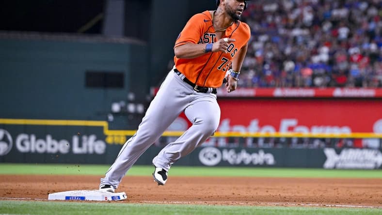 Jul 3, 2023; Arlington, Texas, USA; Houston Astros first baseman Jose Abreu (79) rounds third base and scores the go ahead run against the Texas Rangers during the ninth inning at Globe Life Field. Mandatory Credit: Jerome Miron-USA TODAY Sports