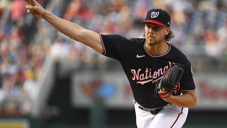 Jul 3, 2023; Washington, District of Columbia, USA; Washington Nationals starting pitcher Jake Irvin (74) throws to the Cincinnati Reds during the first inning at Nationals Park. Mandatory Credit: Brad Mills-USA TODAY Sports