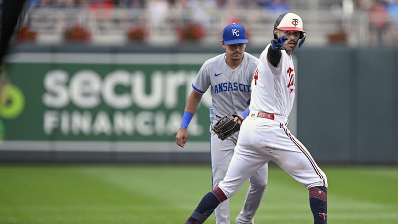 Jul 3, 2023; Minneapolis, Minnesota, USA; Minnesota Twins infielder Carlos Correa (4) celebrates his double against the Kansas City Royals during the first inning at Target Field. Mandatory Credit: Nick Wosika-USA TODAY Sports