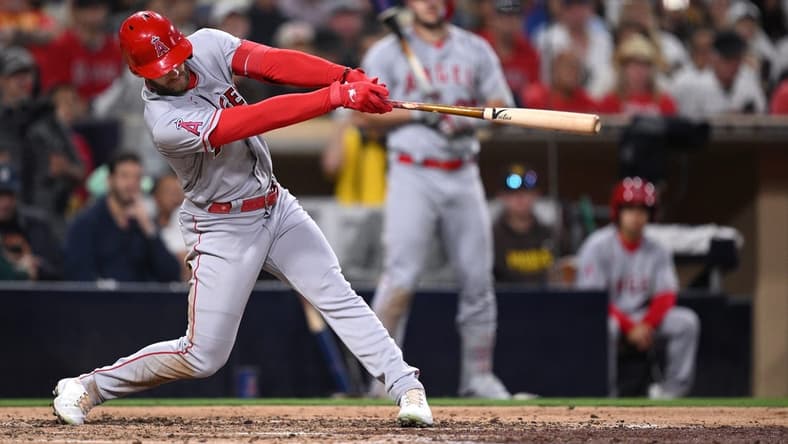 Jul 3, 2023; San Diego, California, USA; Los Angeles Angels left fielder Taylor Ward (3) hits an RBI double against the San Diego Padres during the sixth inning at Petco Park. Mandatory Credit: Orlando Ramirez-USA TODAY Sports