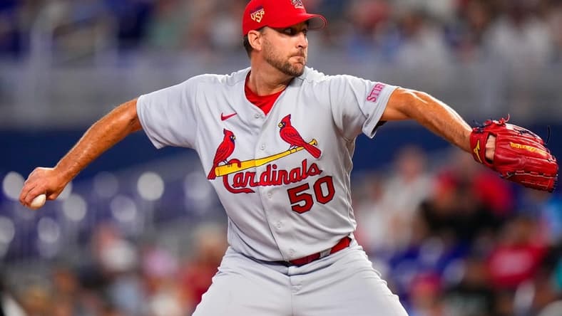 Jul 4, 2023; Miami, Florida, USA; St. Louis Cardinals starting pitcher Adam Wainwright (50) throws a pitch against the Miami Marlins during the first inning at loanDepot Park. Mandatory Credit: Rich Storry-USA TODAY Sports