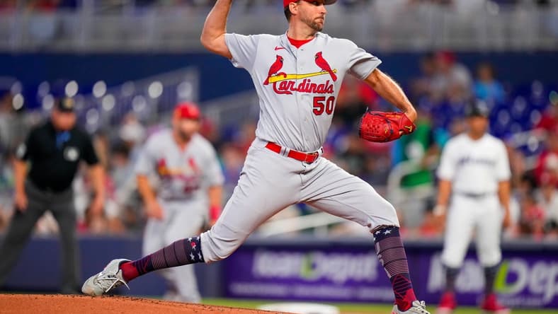 Jul 4, 2023; Miami, Florida, USA; St. Louis Cardinals starting pitcher Adam Wainwright (50) throws a pitch against the Miami Marlins during the first inning at loanDepot Park. Mandatory Credit: Rich Storry-USA TODAY Sports