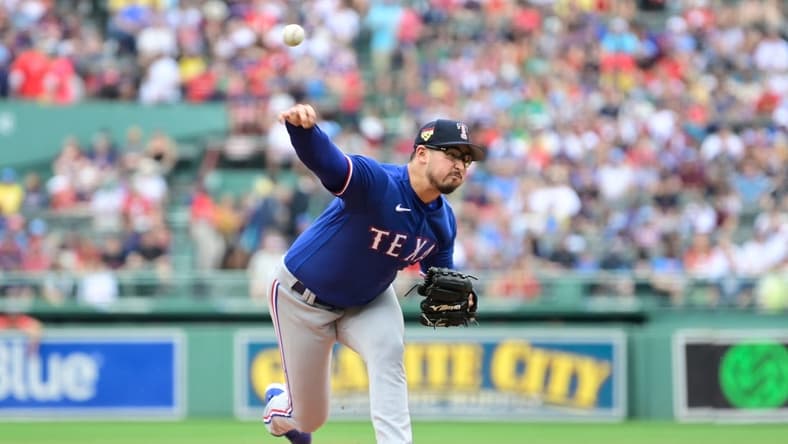 Jul 4, 2023; Boston, Massachusetts, USA; Texas Rangers starting pitcher Dane Dunning (33) pitches against the Boston Red Sox during the first inning at Fenway Park. Mandatory Credit: Eric Canha-USA TODAY Sports