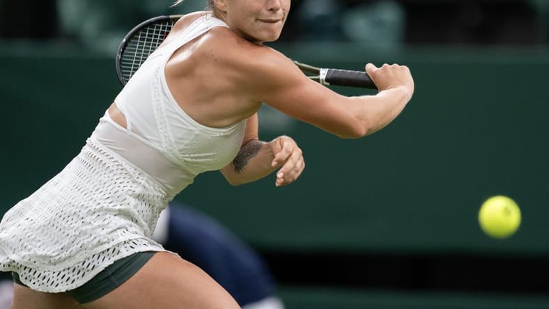Jul 4, 2023; London, United Kingdom; Aryna Sabalenka returns a shot during her match against Panna Udvardy (HUN) on day two at the All England Lawn Tennis and Croquet Club.  Mandatory Credit: Susan Mullane-USA TODAY Sports