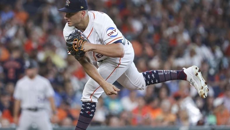 Jul 4, 2023; Houston, Texas, USA; Houston Astros starting pitcher Brandon Bielak (64) delivers a pitch during the first inning against the Colorado Rockies at Minute Maid Park. Mandatory Credit: Troy Taormina-USA TODAY Sports