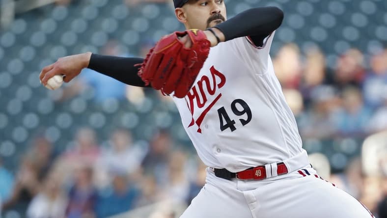 Jul 5, 2023; Minneapolis, Minnesota, USA; Minnesota Twins starting pitcher Pablo Lopez (49) throws to the Kansas City Royals in the first inning at Target Field. Mandatory Credit: Bruce Kluckhohn-USA TODAY Sports