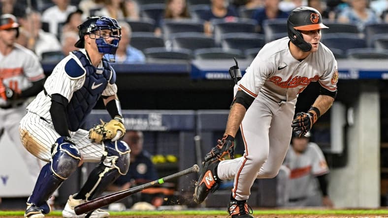 Jul 5, 2023; Bronx, New York, USA; Baltimore Orioles left fielder Colton Cowser (17) hits a RBI single against the New York Yankees during the sixth inning at Yankee Stadium. Mandatory Credit: John Jones-USA TODAY Sports