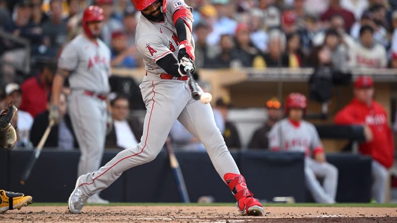 Jul 5, 2023; San Diego, California, USA; Los Angeles Angels left fielder Jo Adell (7) hits an RBI double against the San Diego Padres during the third inning at Petco Park. Mandatory Credit: Orlando Ramirez-USA TODAY Sports