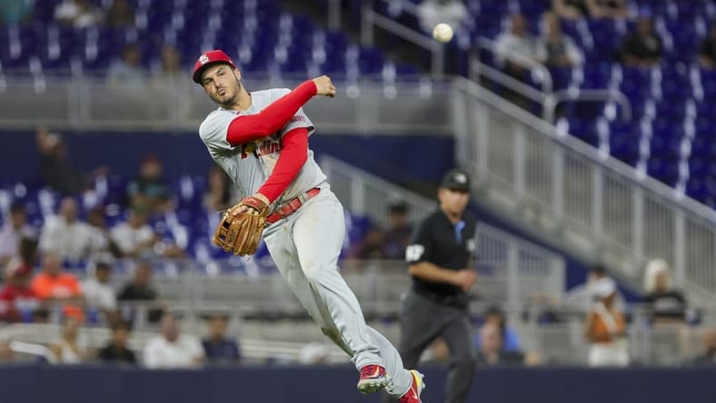Jul 5, 2023; Miami, Florida, USA; St. Louis Cardinals third baseman Nolan Arenado (28) throws the baseball to first baseman Paul Goldschmidt (not pictured) and retires Miami Marlins center fielder Dane Myers (not pictured) during the seventh inning at loanDepot Park. Mandatory Credit: Sam Navarro-USA TODAY Sports