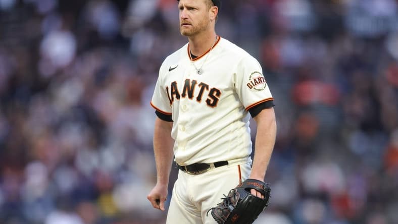 Jul 5, 2023; San Francisco, California, USA; San Francisco Giants starting pitcher Alex Cobb (38) reacts after getting called for a balk during the sixth inning against the Seattle Mariners at Oracle Park. Mandatory Credit: Sergio Estrada-USA TODAY Sports