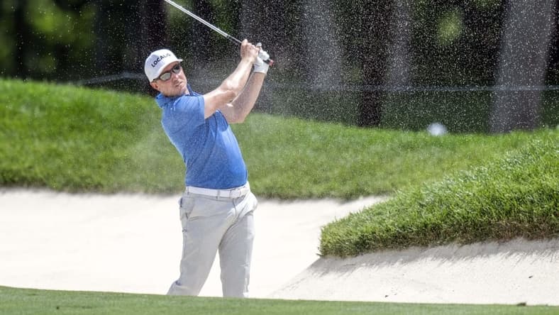 Jul 6, 2023; Silvis, Illinois, USA; Jonas Blixt hits a shot out of a fairway bunker on the 18th hole during the first round of the John Deere Classic golf tournament. Mandatory Credit: Marc Lebryk-USA TODAY Sports