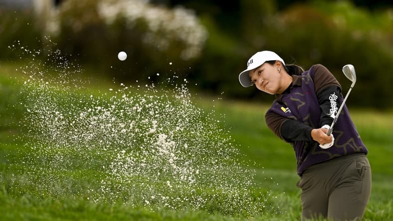 Jul 6, 2023; Pebble Beach, California, USA; Annie Park hits out of the bunker on the 14th hole during the first round of the U.S. Women's Open golf tournament at Pebble Beach Golf Links. Mandatory Credit: Kelvin Kuo-USA TODAY Sports
