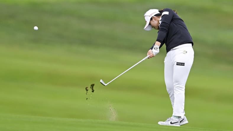 Jul 6, 2023; Pebble Beach, California, USA; Xiyu Janet Lin hits an approach shot on the 13th hole during the first round of the U.S. Women's Open golf tournament at Pebble Beach Golf Links. Mandatory Credit: Kelvin Kuo-USA TODAY Sports